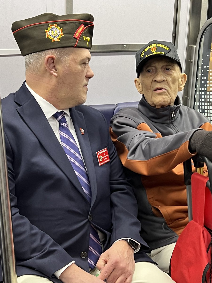VFWCO's tweet photo. .@VFWCO Sr. Vice Commander @johnkeene strikes up a conversation on the DC Metro this morning with 100 y/o WWII German interpreter who served in the Pacific with the 25th ID

#VFWDC2023 #Veterans @VFWHQ @VFW_OfficeDC https://t.co/yERBOwpUkN
