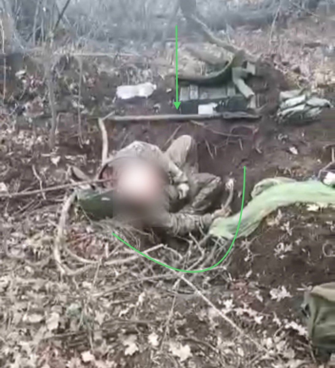 sternenko's tweet photo. a Ukrainian soldier was forced to dig his own grave before being shot for saying "Glory to Ukraine".
A shovel and a dug hole can be seen on the chest. https://t.co/7R2OAeI5IP