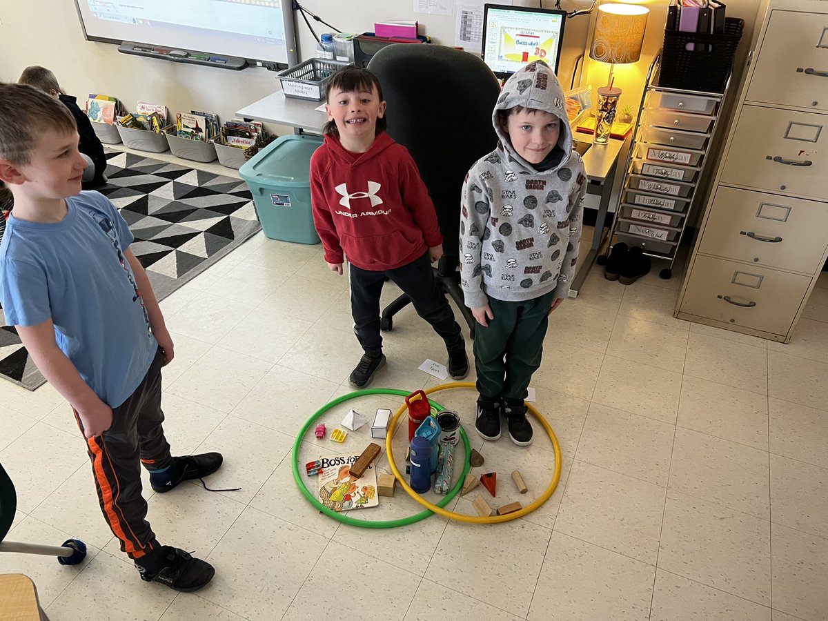 Hands on 3D shape scavenger hunt!! Grade 1’s used their knowledge of attributes and 3D shapes to make real life venn-diagrams! We found it was a little bit easier to find objects that either had flat faces or BOTH flat and round faces. <a href="/ParkviewPS/">Parkview PS</a>