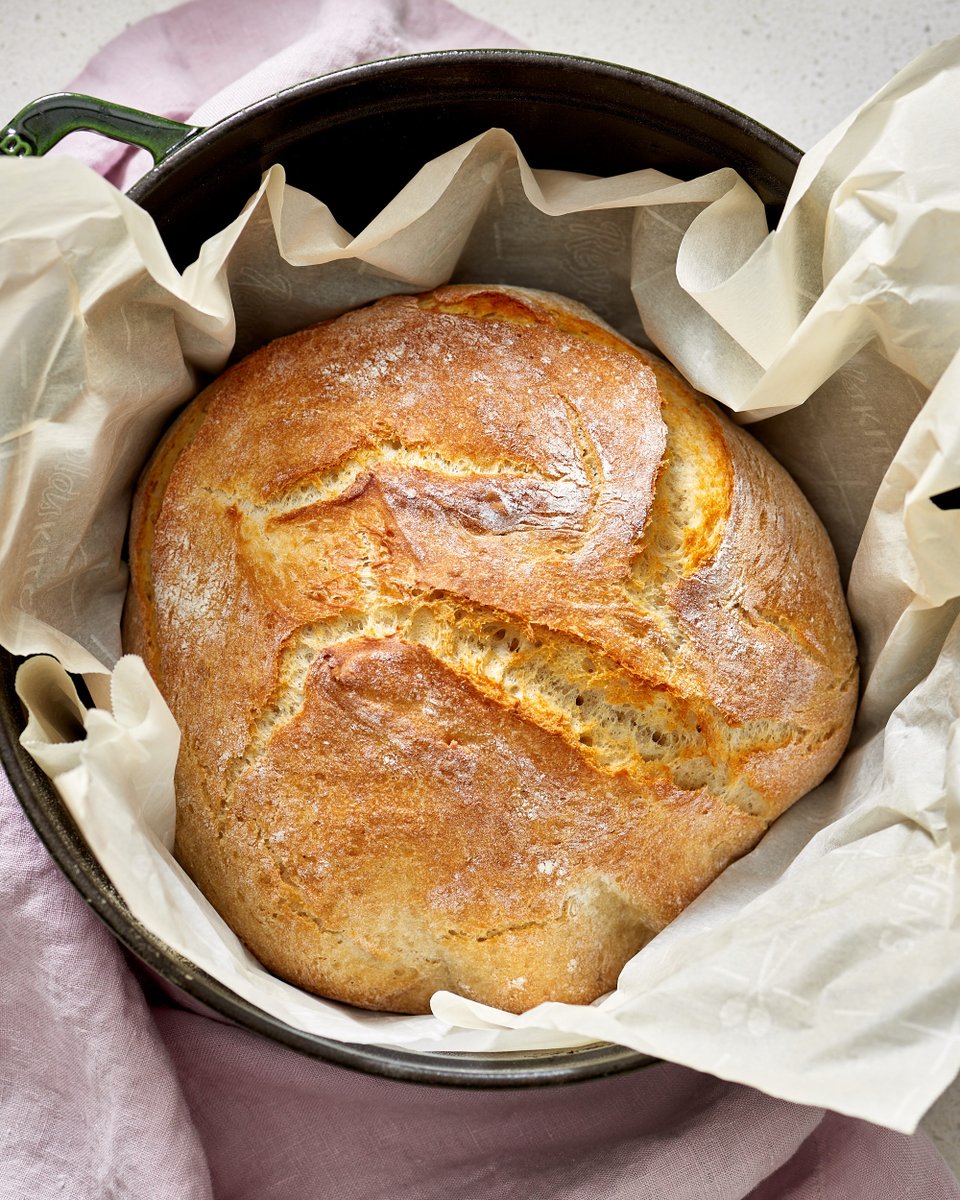 thekitchn's tweet photo. This loaf is the simplest bread we know how to bake at home and it requires no stand mixer, no starter, no special knowledge, and no kneading: https://t.co/swLrrSTJXP https://t.co/LiG2Li05Xn