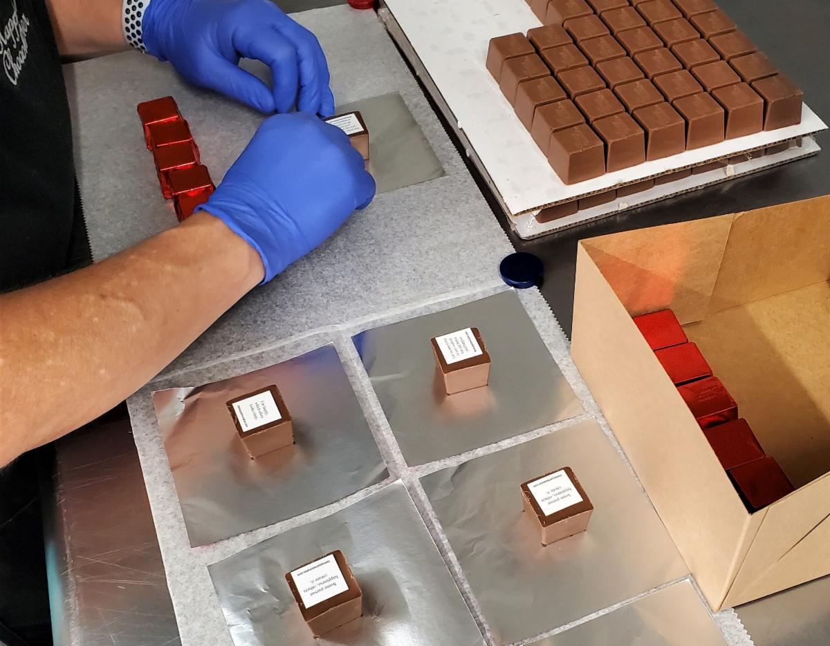 Wrapping happy thoughts into every chocolate truffle Cubze. Wonderful chocolate + inspirational thoughts = happiness :)
#spreadchocolatehappiness #chocolate #chocolatetruffle #happiness #happy #inspiration