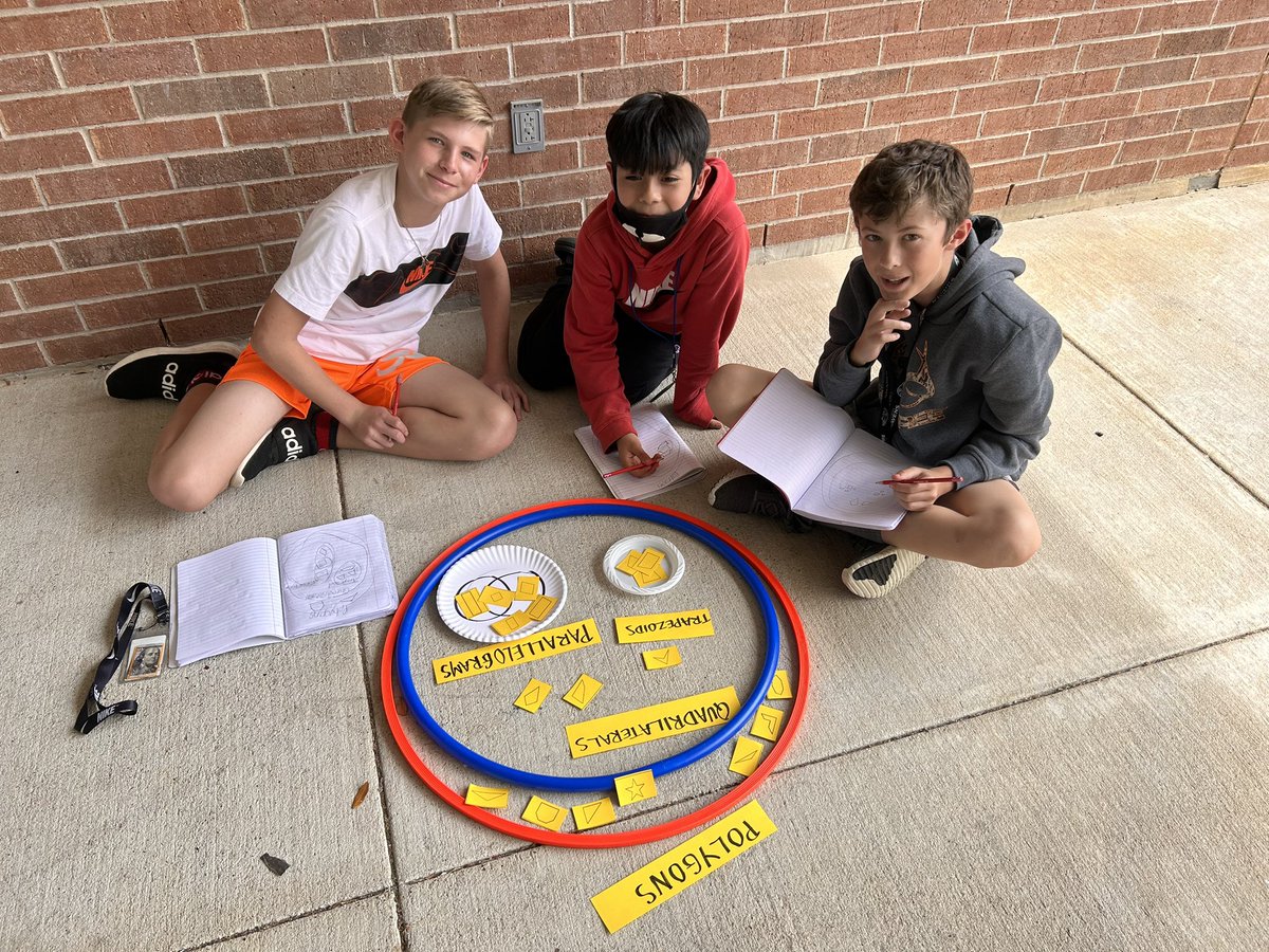 Classifying 2D figures with hula hoops on this beautiful day!  #TESbulldogs  #WISDgreatness