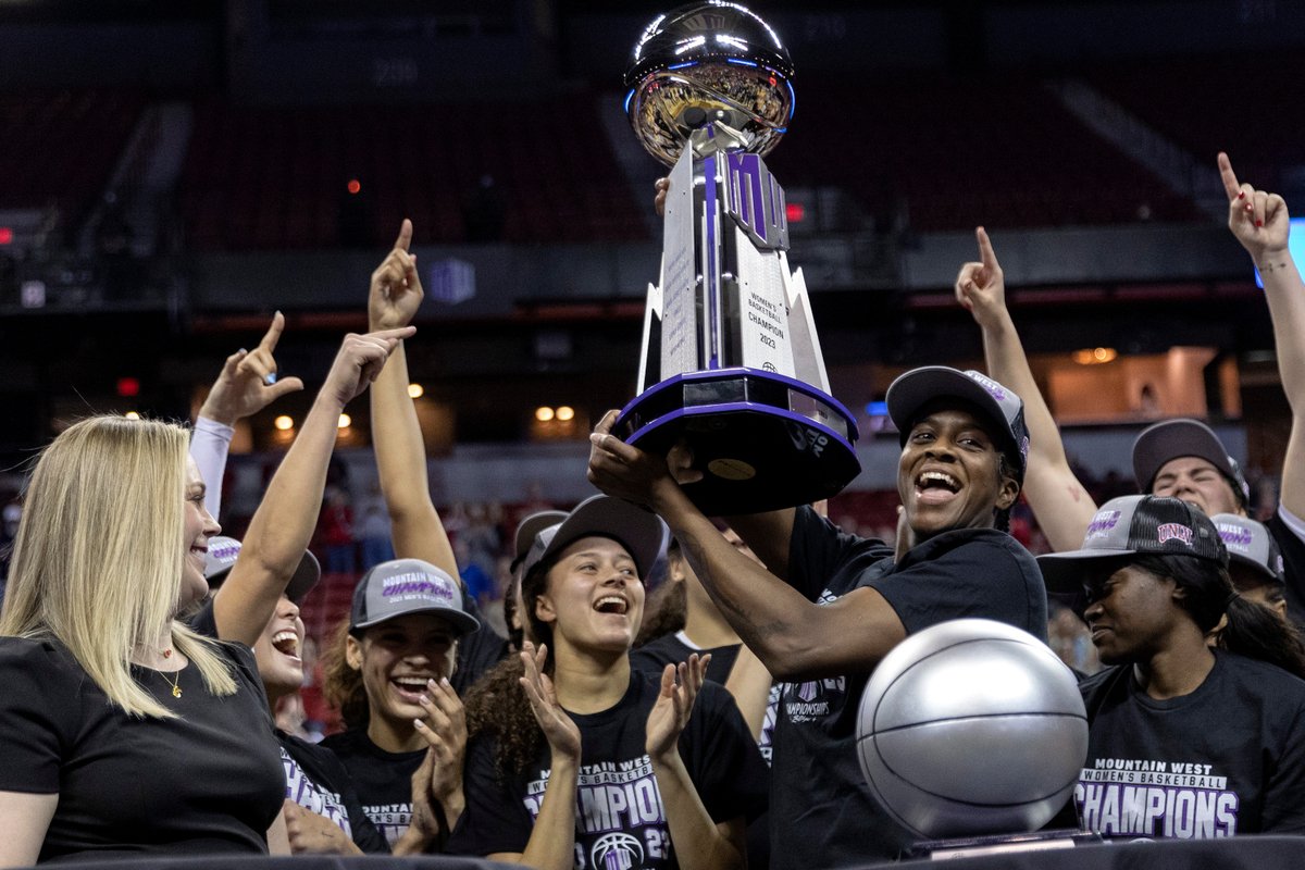 UNLV center and tournament Most Valuable Player Desi-Rae Young holds up her team’s trophy after the No. 21-ranked Lady Rebels won the Mountain West tournament title Wednesday with a 71-60 victory over Wyoming at the Thomas & Mack Center. @ellenschmidttt @reviewjournal