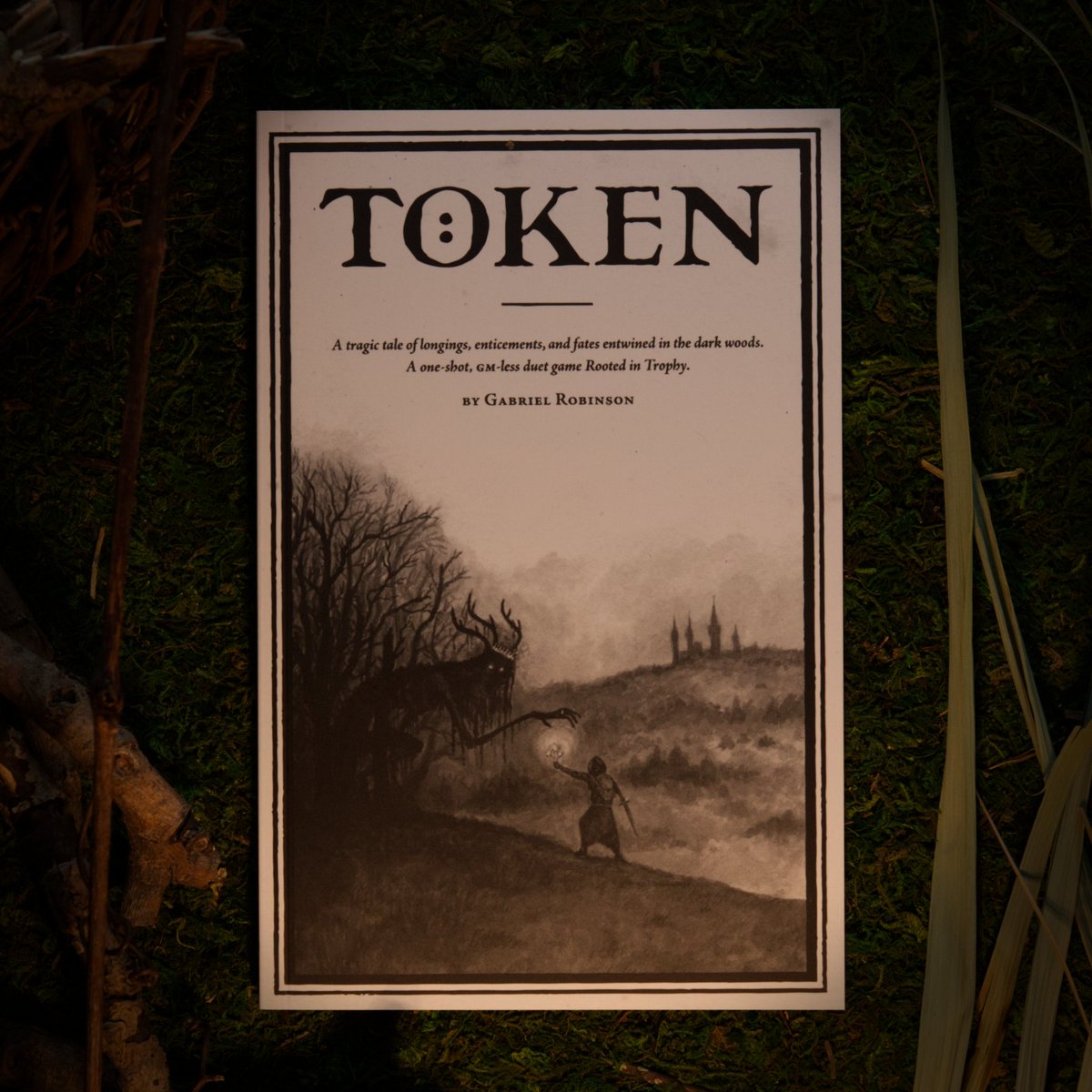 Token by <a href="/Glowing_Roots/">Glowing Roots Press</a> is a tale of longings, enticements, and fates entwined in the dark woods. This one-shot, GM-less duet game, inspired by dark fairytales and folklore, has a rules-light, narrative-rich framework to encourage risky choices and evocative storytelling.