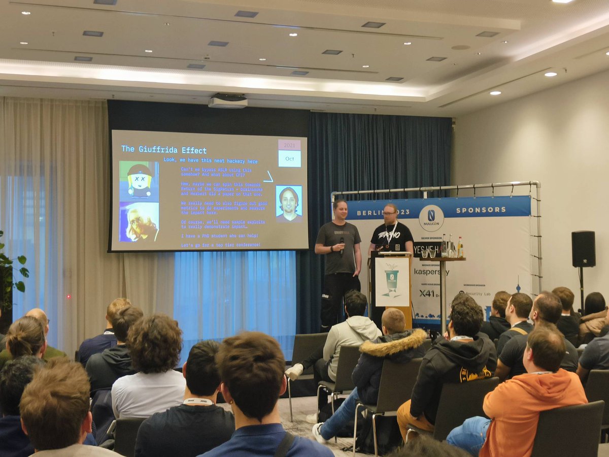 nullcon's tweet image. 🍜Chop Suey with #BufferOverflows! 

💻Marius @nSinusR &amp;amp; Fabian @p1onk  shared quite an interesting journey of how they investigated exploit primitives in real-world software &amp;amp; built new exploits from old #bugs

#NullconDE2023 #Infosec #Cybersecurity