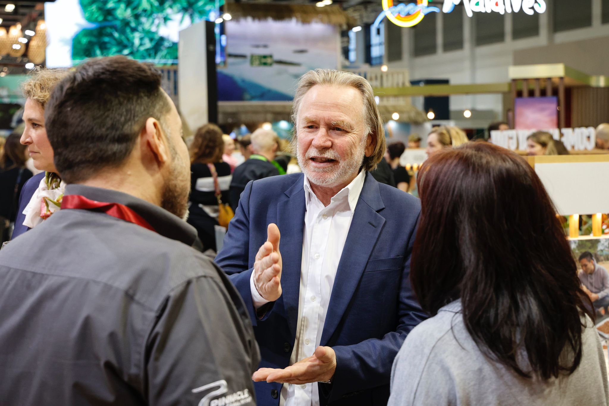 Ambassador Philip Green talking with Australian exhibitors at the ITB.