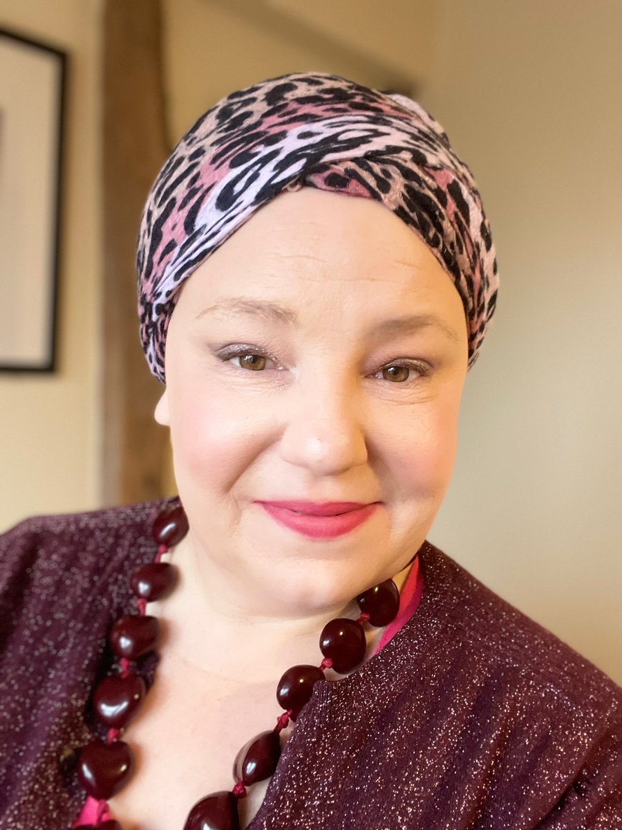 Lipstick on, shoulder pads in and headscarf tied. 

I am ready to do battle with chemo round 4. 

I am starting Docetaxel today which will destroy my cancer cells. I am a little scared of what it will do to me in the process. 

I do still have eyebrows though!