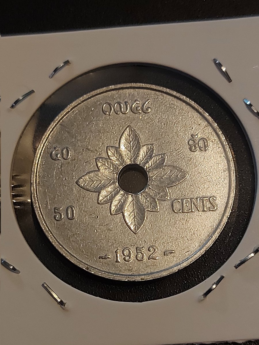 McCormark's tweet image. 1952 Laos 50 cents. Minted the year before Laos gained independence from France. 6 years later, in 1958 it was caught in the Vietnam War and a massive US bombing campaign began over Laos. About 80 million bombs didn't explode and still kill about 50 people every year.