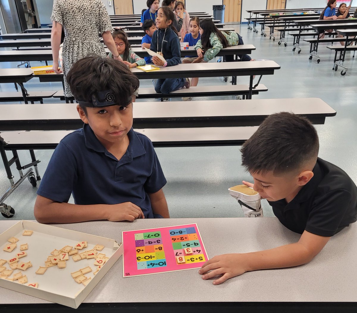 Fellsmere Extended Day program doing peer to peer tutoring! Older students helping younger students