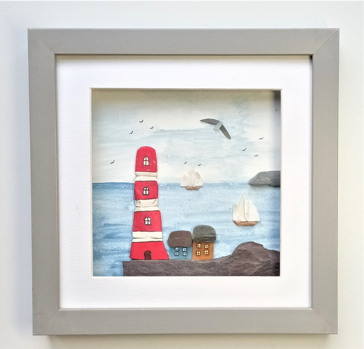 Beachstreetart's tweet image. Beachcombed coastal wall art #seapottery #seaglass #seashells #coastal #wallart #lighthouse #Cornwall etsy.com/uk/beachstreet…