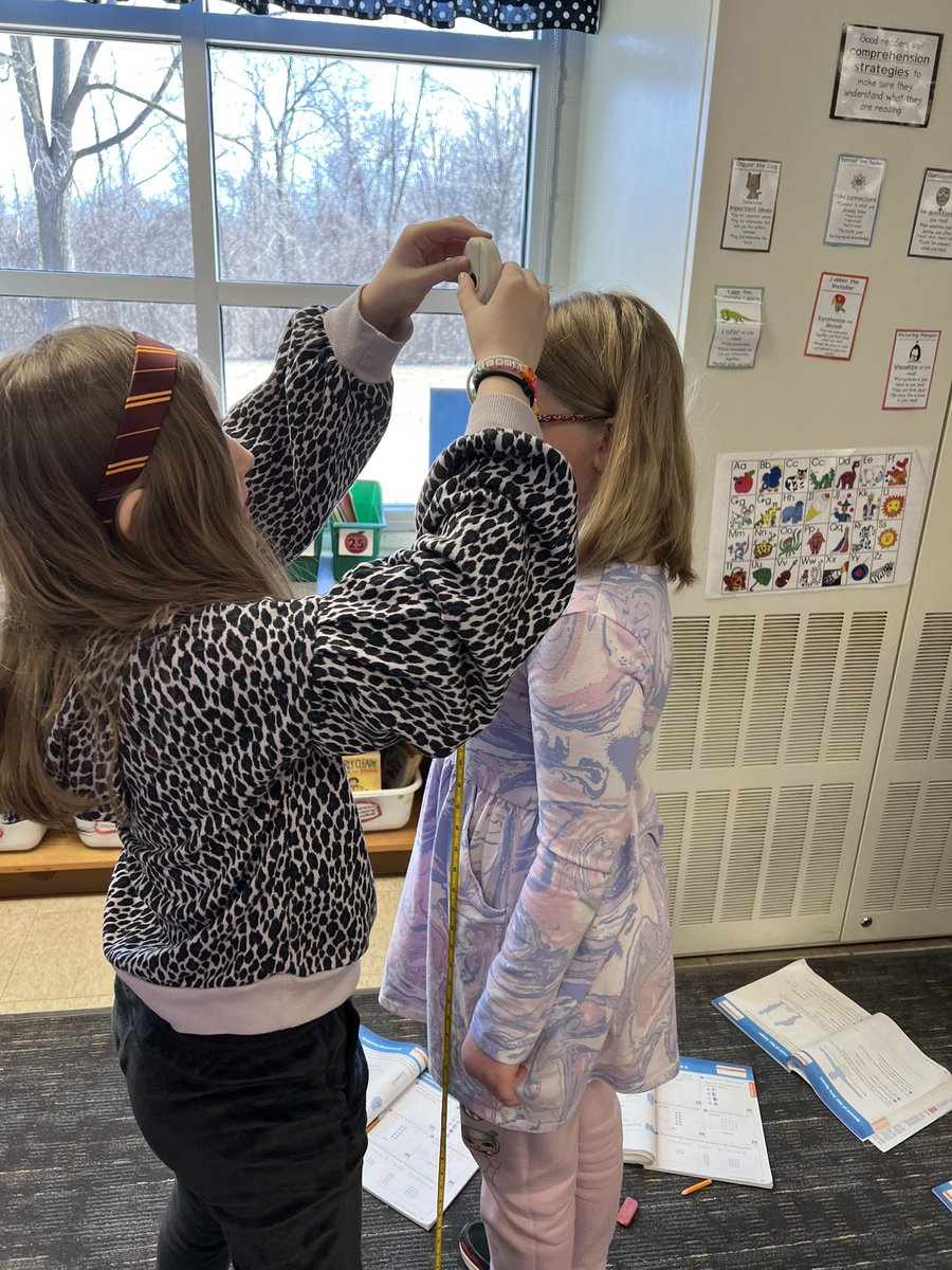 Buch2ndGrade's tweet photo. We are measuring our arm spans, head circumferences, and shoes! #BuchananBears #LivoniaPride https://t.co/u6p5mquZ3s
