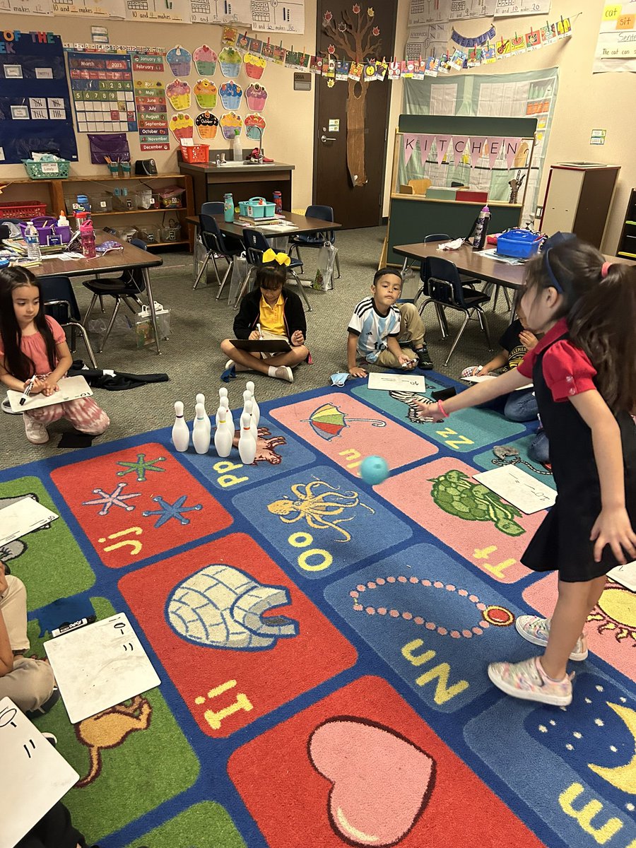 MsAllberry's tweet photo. We had so much fun with subtraction bowling! Each student had a chance to bowl and write a subtraction sentence based on how many pins were knocked down. 🎳 #SubtractionSuperstars  @Martin_Mustangs https://t.co/hVmujLSsFS