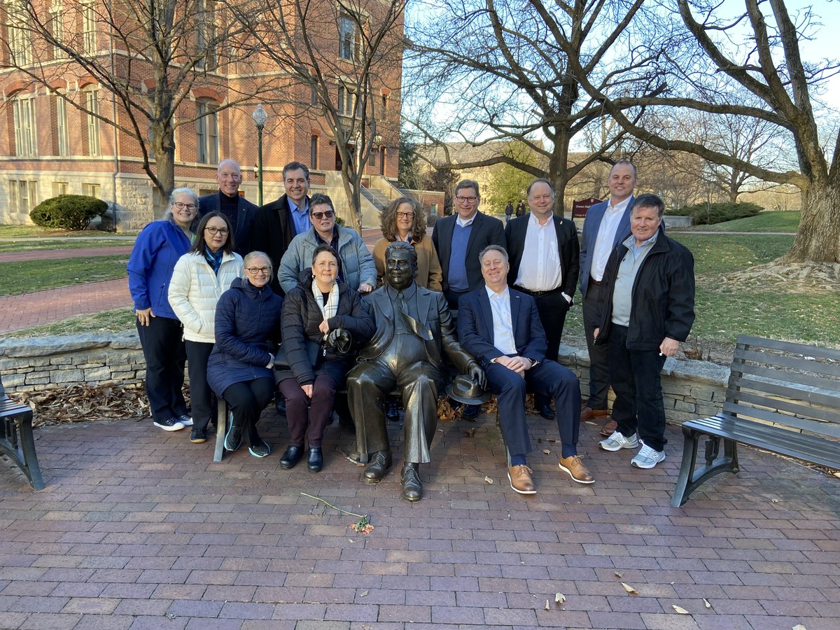 CIOs from across the Big Ten Academic Alliance at the statue of Herman B Wells, 11th president of Indiana University and founder of the BTAA! ( fun fact, his middle name is B, no initial.)
