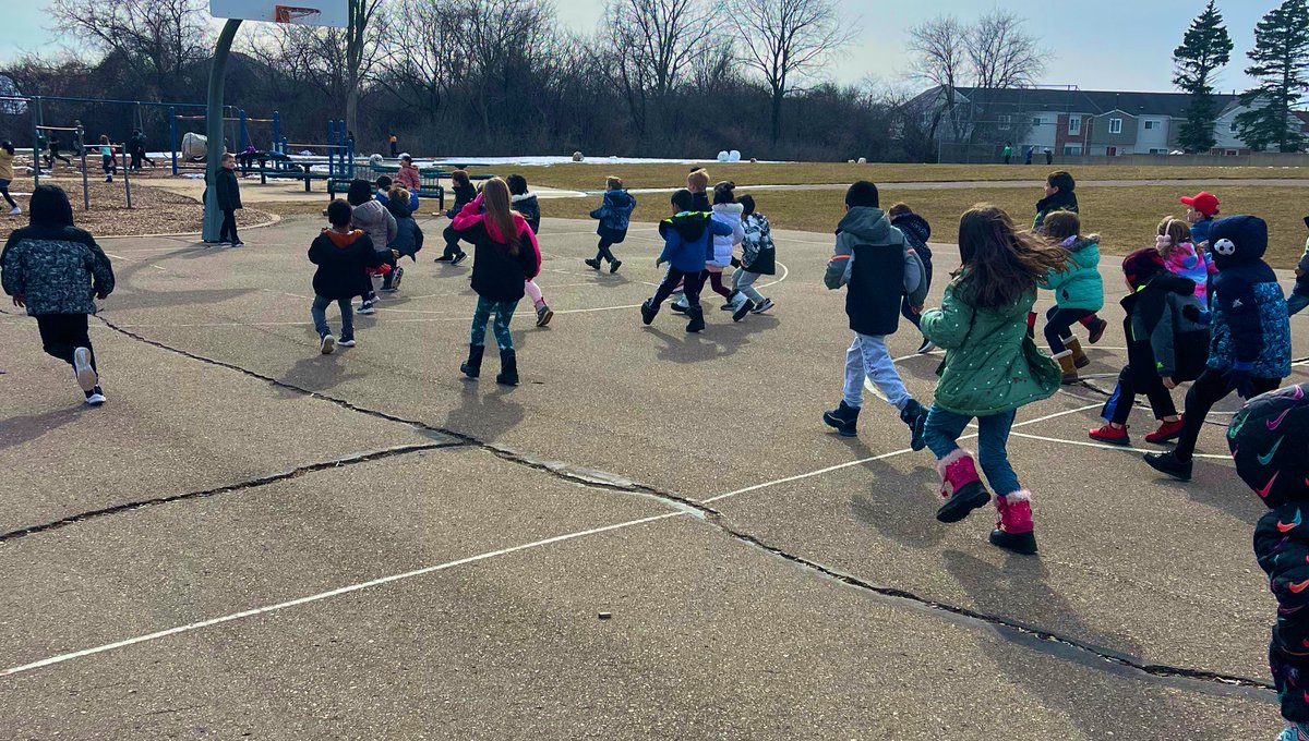 1st grade students enjoying <a href="/PlayworksMI/">Playworks Michigan</a> and their time with Coach Monet!