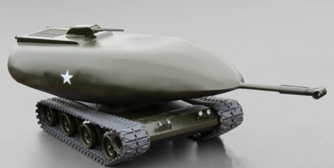 Photo of a model of the Chrysler TV-8 nuclear-powered tank. It looks like the bottom chassis of a tank with an enormous bulbous, aerodynamic current.