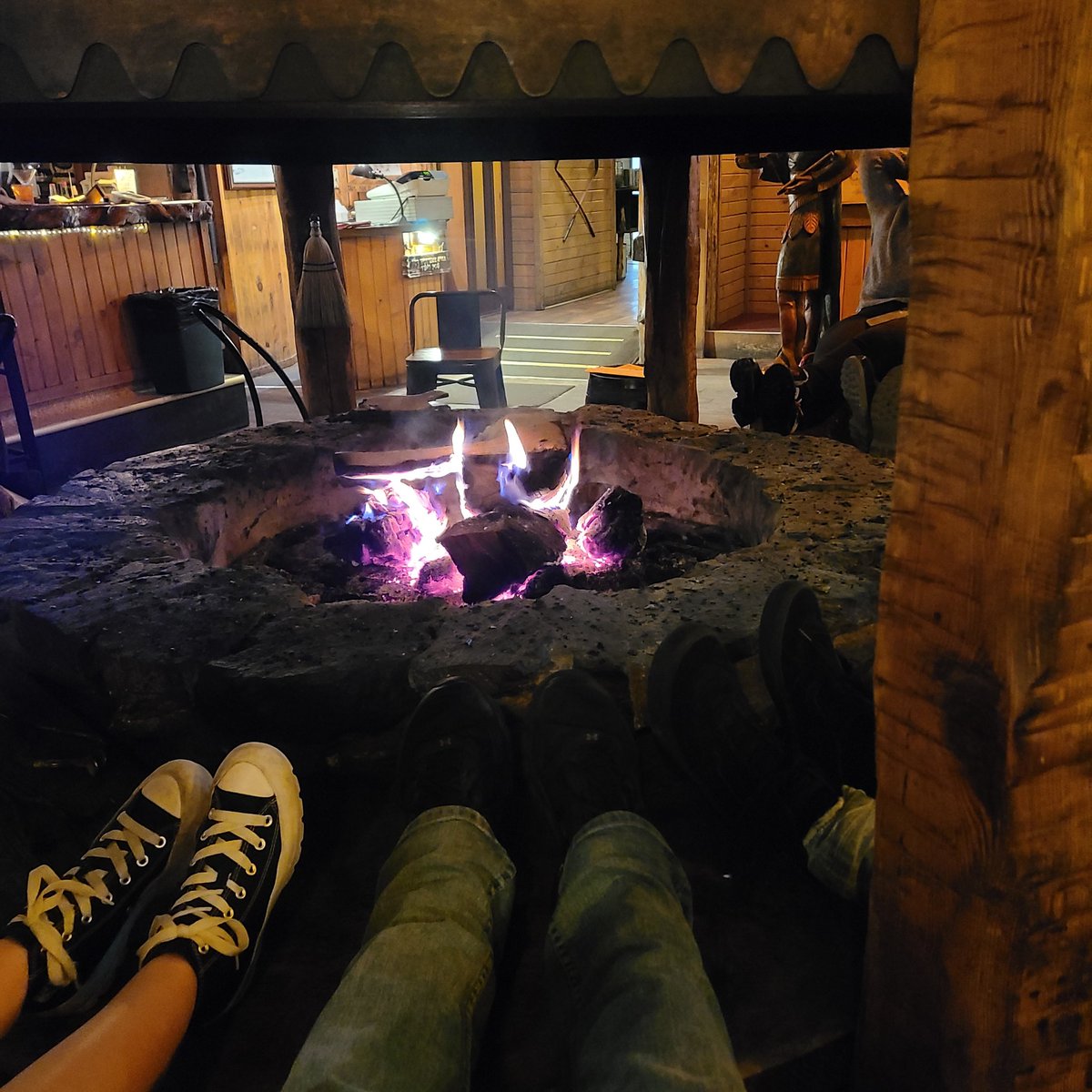 Having a glass of port wine by the fire at a great restaurant.