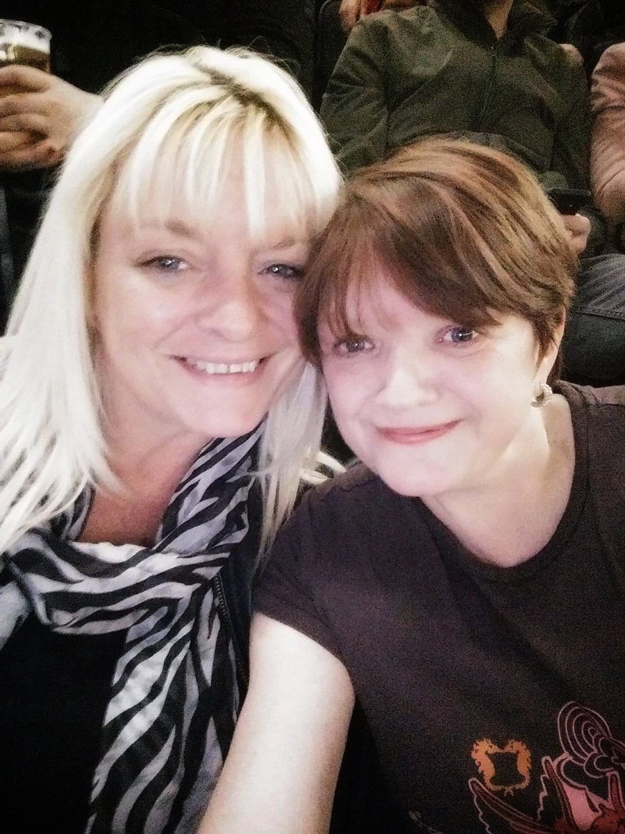 Suestupot's tweet photo. @JaneyGodley This is me and my youngest sister. I'm the one on the right. Sadly my sister passed away 3 years ago aged 47. This pic is at at MEN arena watching Mickey Flannigan. Brilliant night, never stopped laughing 💖 https://t.co/TxrOhIPMPW