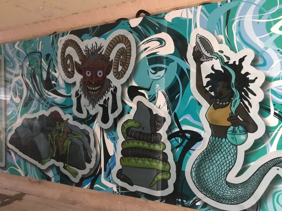 MagicTorchComix's tweet image. We donated artwork from some of our previous projects to help brighten up 2 Inverclyde underpasses - so now at Regent St you can explore myths and legends with art by Andy Lee @mrpickers and down at KFC it's 'The Galoshans Tunnel' with art from @RobinHenley @zucomics Go see!