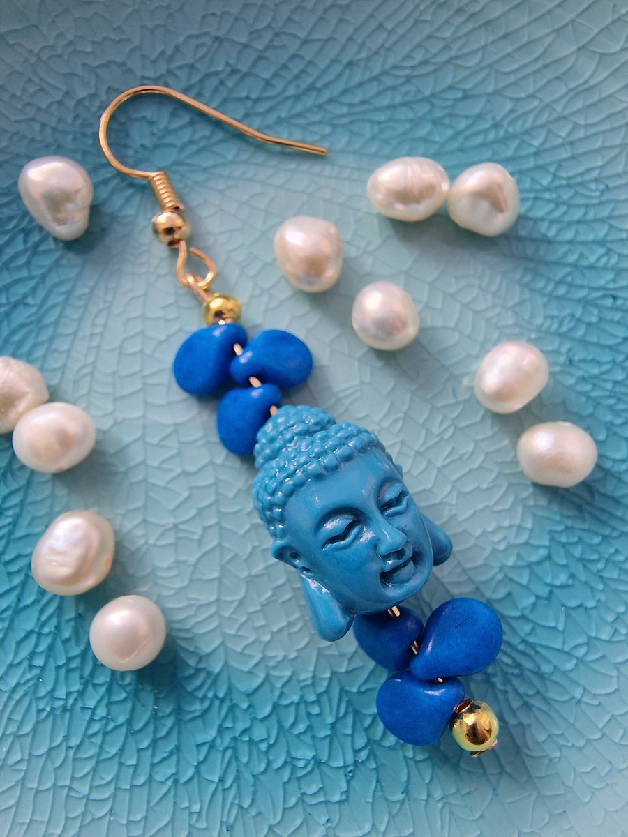 Single Buddha earrings in various colours, shown here in blue and gold. Visit designeyegallery.com

#handmade  #handmadejewellery #handmadejewelery #handmadegifts #colourful   #cheshirebusiness #creative #buddha