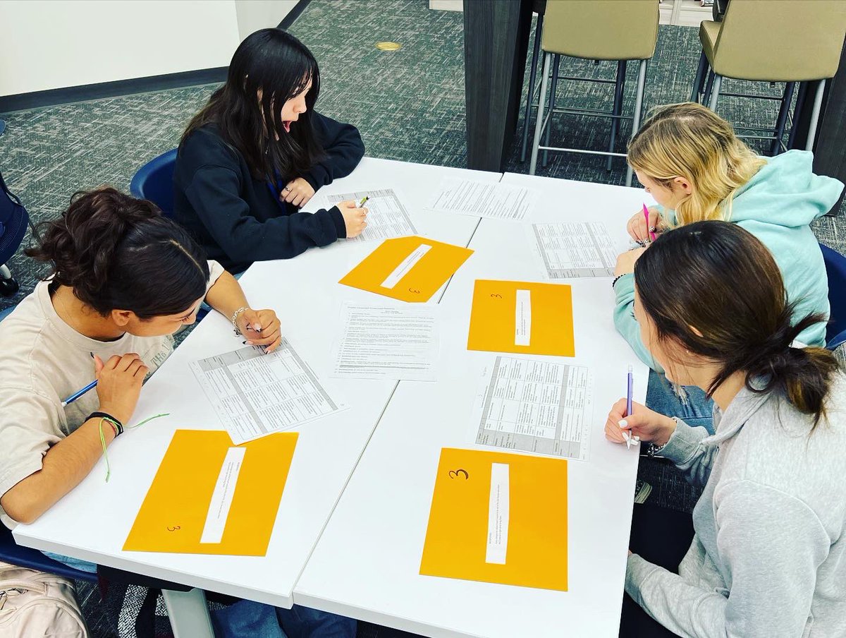 brazoswoodlib's tweet photo. English 2 classes are doing gallery walks today! At each station, students are analyzing paragraphs and determining how they would be graded if they were turned in as a STAAR EOC exam. They’re enjoying the peer editing process! #bucbooks #bucpride #beconnected #highschoollibrary https://t.co/VmmGpMqgx9