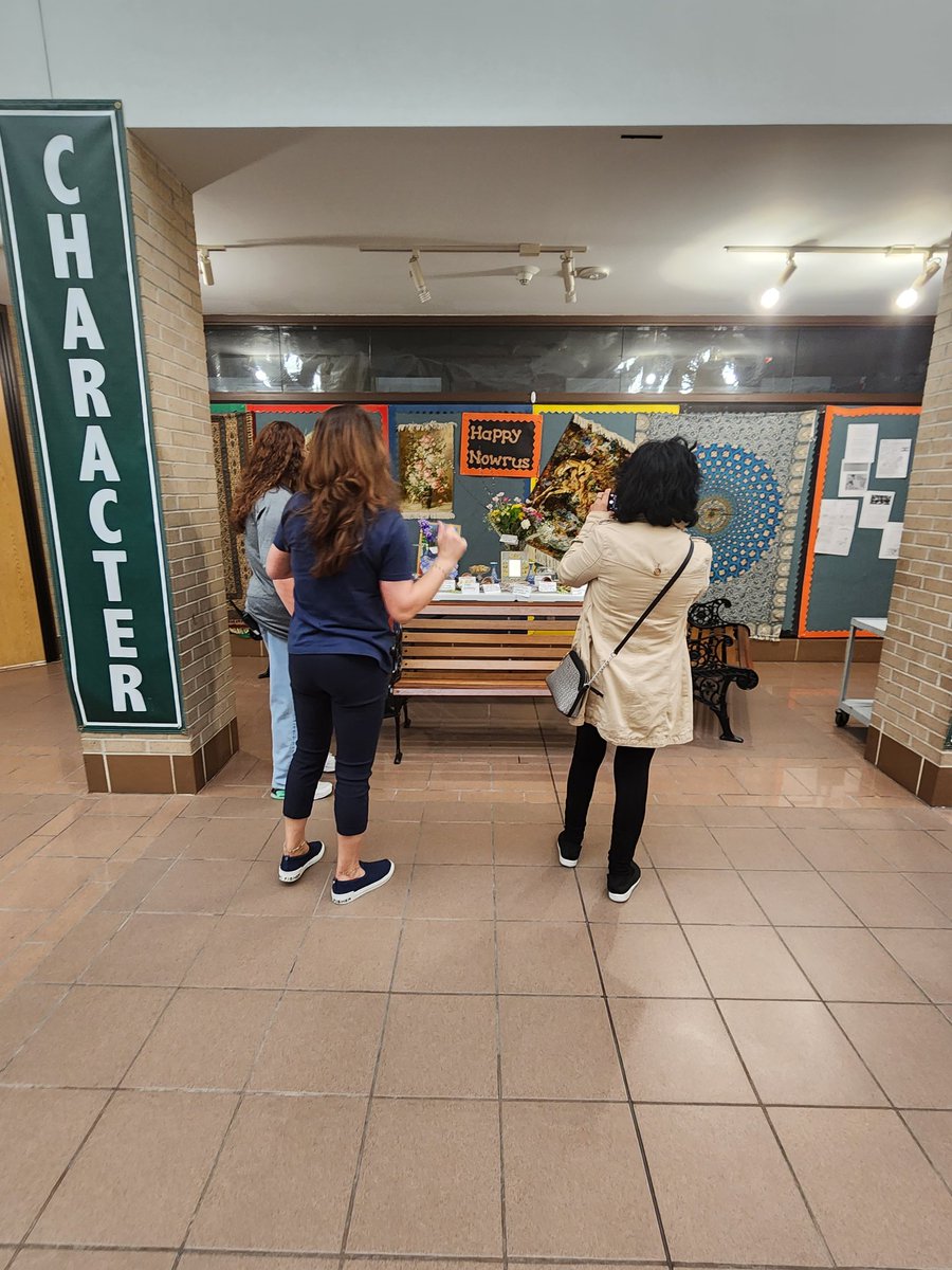 EMarie857's tweet photo. Happy Nowruz from @Youens_Gators! Thank you, Mrs. Shams, for sharing your personal items with staff &amp; students and setting up the presentation! It's very rich in Iranian culture! 💚🤍❤️ https://t.co/HsEZWpkKlb