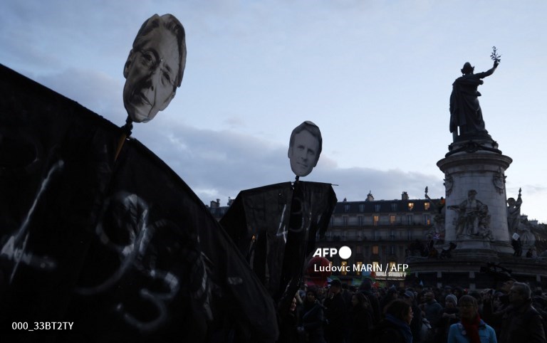 AFPphoto's tweet photo. #France - Macron defiant as anger smoulders over French pension reform. #AFP 
📸 Nicolas Tucat
📸 @LoicVenance
📸 @ludovic_marin https://t.co/kskhUcCgFD