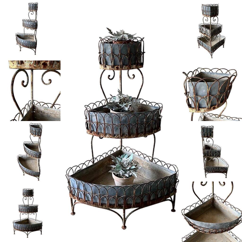19th century, beautiful decorative, three-tiered, French iron corner plant stand with its original zinc liners.

This stunning Presentoire a Plantes, in waterfall style,  is decorated with wonderful wirework surrounds and wrought iron scrolling to the fr… instagr.am/p/CqFaetKItrV/