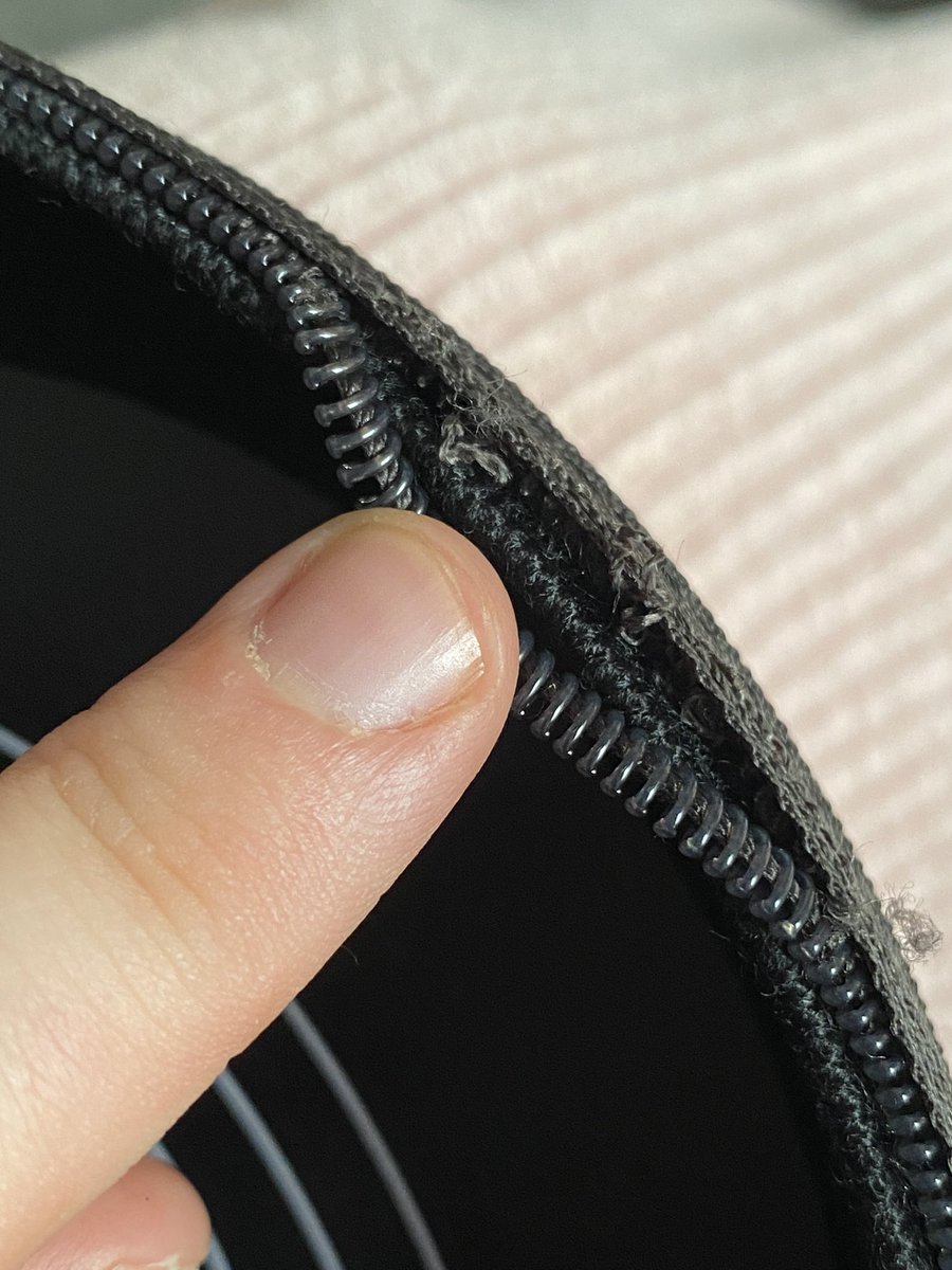 missmullz's tweet photo. @SonyUK hello, the zip on the case of my headphones seems to be coming off, it wouldn’t be an issue if it didn’t keep getting stuck therefore not being able to close it all the way. is there anything you can do? https://t.co/tZBAK8AhuR