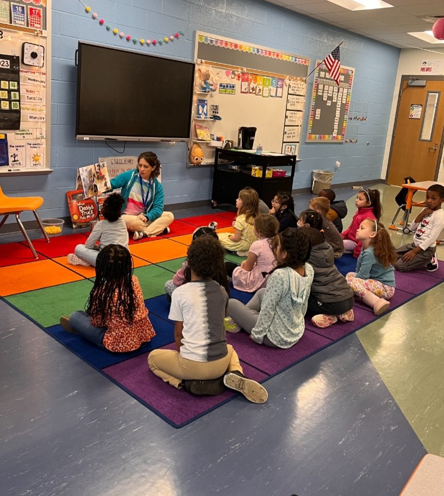 GRPChesapeake's tweet image. It's Guest Reader Day at Greenbrier Primary School, Mrs. Barley's kindergarten class is   doing a great job listening to Mrs. Mason.
#MarchisReadingMonth
#GuestReader