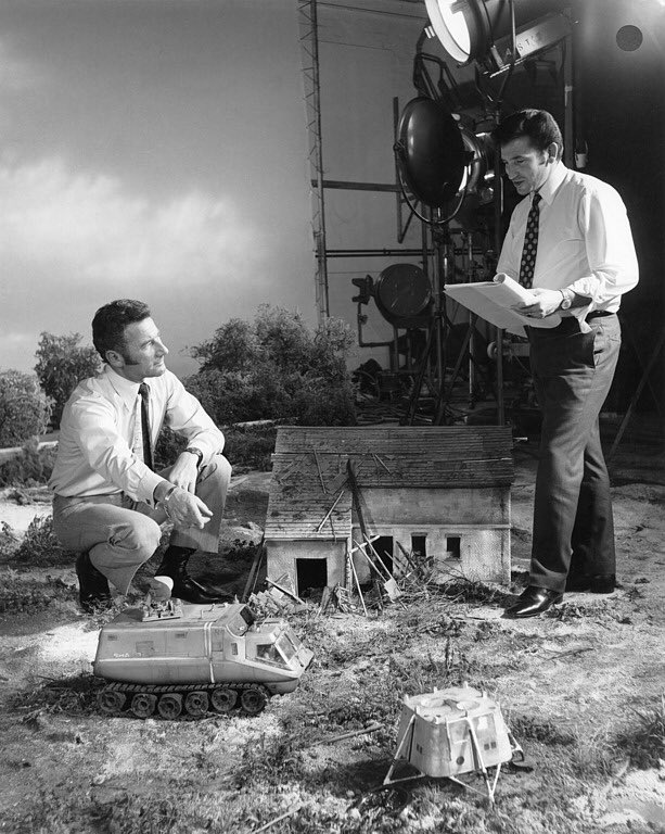 philzink's tweet photo. UFO

The REMOTE CONTROLLED SPACE DUMPER as seen in
 “The long Sleep”.
And one of my favourite behind the scenes photos with the SHADO MOBILE COTROL, Derek Meddings &amp; Ken Holt. 
#UFO #GerryAnderson #DerekMeddings #KenHolt #SHADO #Mobile https://t.co/U4RGtIar8H