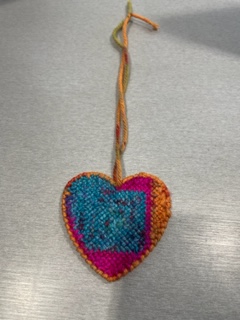 Cross-stiching at its finest. RECHS students made rearview mirror hangers during Makerspace this month! #Makersgonnamake #creativity