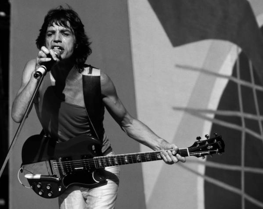Mick Jagger performing at The Candlestick Park in San Francisco, California, 1983. Photo by Larry Hulst.
