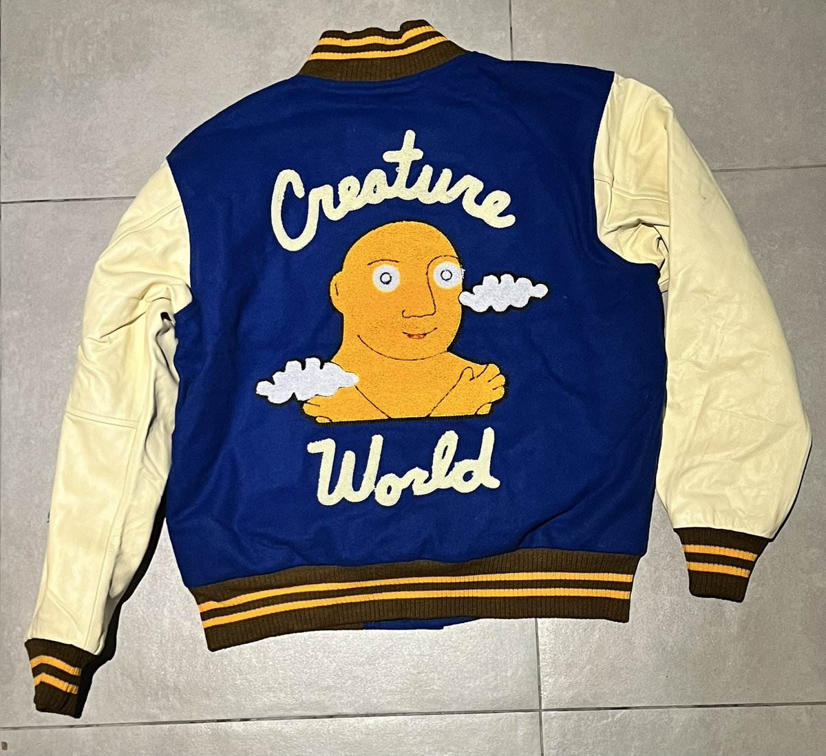 a0ys6m4a0l8rxp5's tweet photo. Collected my @creatureworld varsity jacket today! 

Held up at the customs for unpaid duty/tax for 5 months!

@dobbyman_nft kindly dm back. https://t.co/xc3WvlpFcd