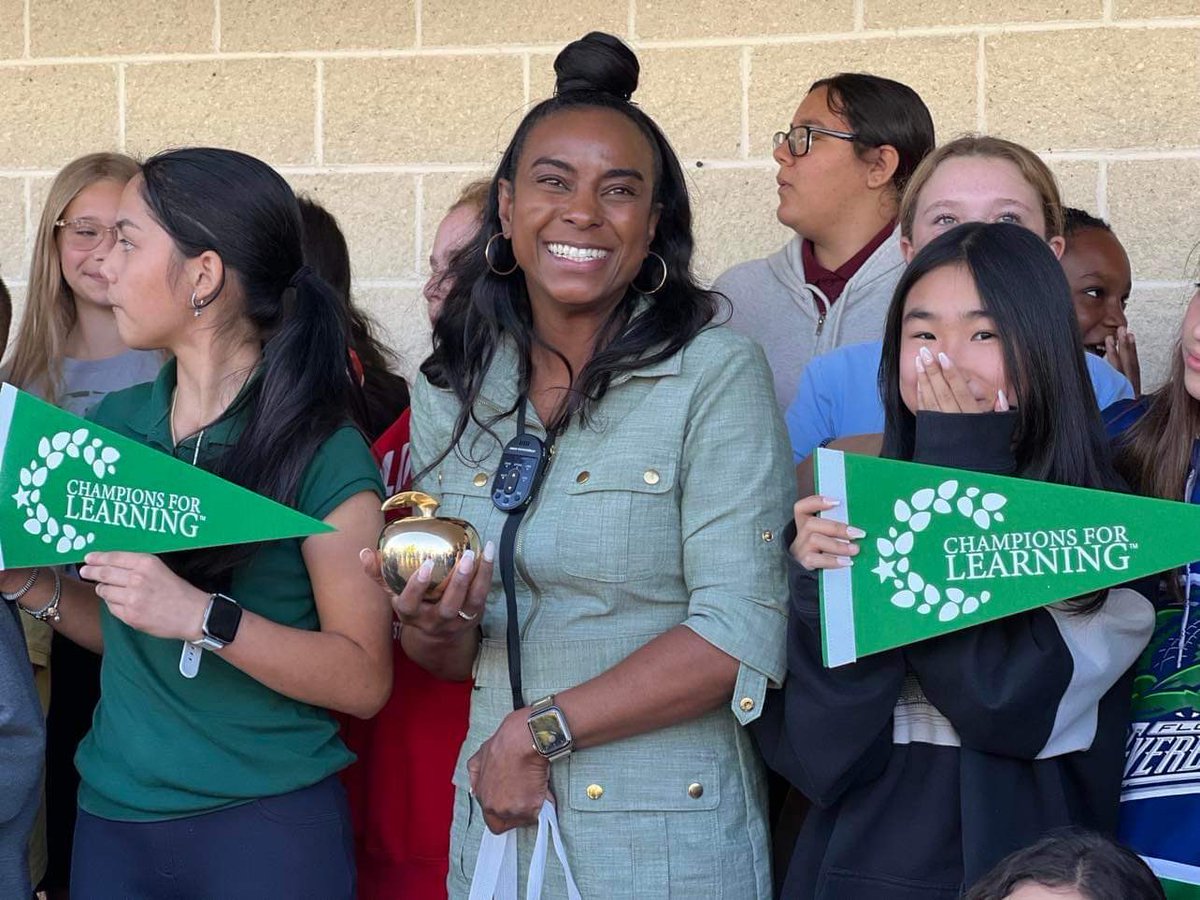 collierschools's tweet photo. The second stop for the @Champs4Learning #GoldenAppleCollier prize patrol was @CESCorkyBear. Congratulations to fifth-grade math teacher D’Nai Bullen! She’s been teaching for 19 years and we are so lucky to have her! #CCPSProud https://t.co/dnd2LYT02F