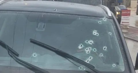 michaeldickson's tweet photo. The terrorist who fired 18 bullets at a car carrying a family didn’t realize that this was David Stern’s, former US Marine. Though shot in the head, David managed to shoot the terrorist, saving his wife and 3 children. He made himself a tourniquet, and walked to the ambulance. https://t.co/hGioR2igpG
