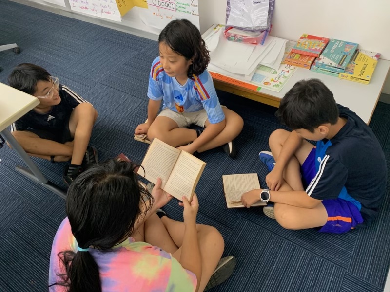 AISCElementary's tweet photo. First day of fantasy book clubs in #AISCGrade5. Such excitement around starting new shared texts! #AISCElementary #AISCLiteracy https://t.co/nPrvfBUibK