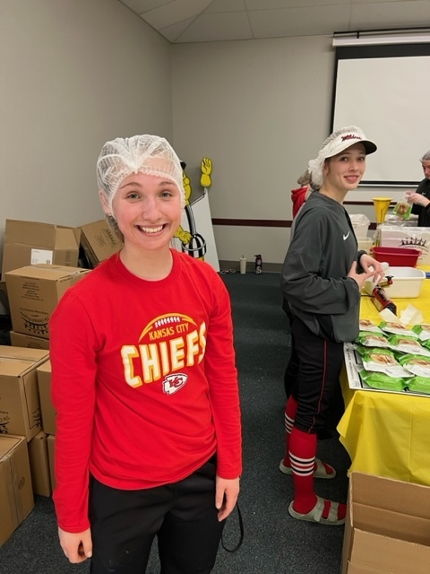 ElDoHSWildcats's tweet photo. The EHS softball team packaged meals with The Outreach Program yesterday evening. This organization helps provide food, clean water, medical care and education across the globe. Way to give back EHS softball! We are grateful to have you as #PartOfThePride! https://t.co/w8KEqBMWUi
