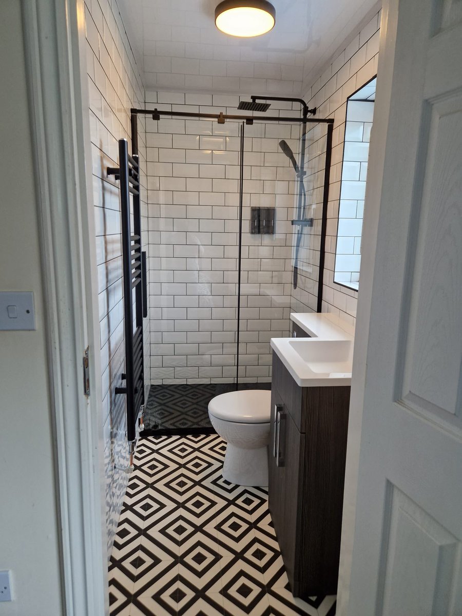 Before and after en-suite , white retro tiles with Black grout