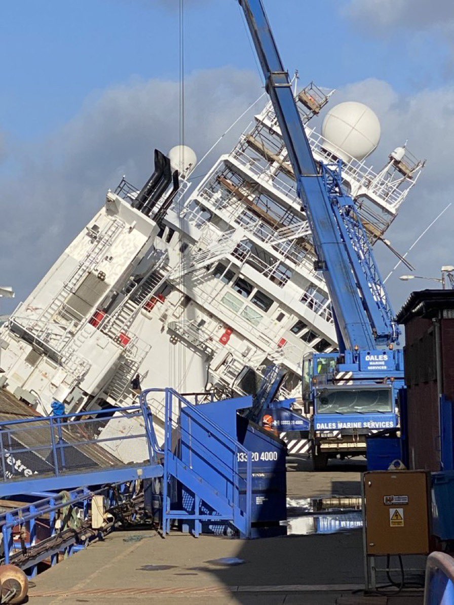 LlysHelig's tweet photo. Sorry to see MV Petrel owned by late Paul Allen falling over in dry dock - thoughts with 25 people injured and 15 in hospital. Wish for speedy recovery and that boat can get back out doing marine exploration. https://t.co/XPvwxMHpow