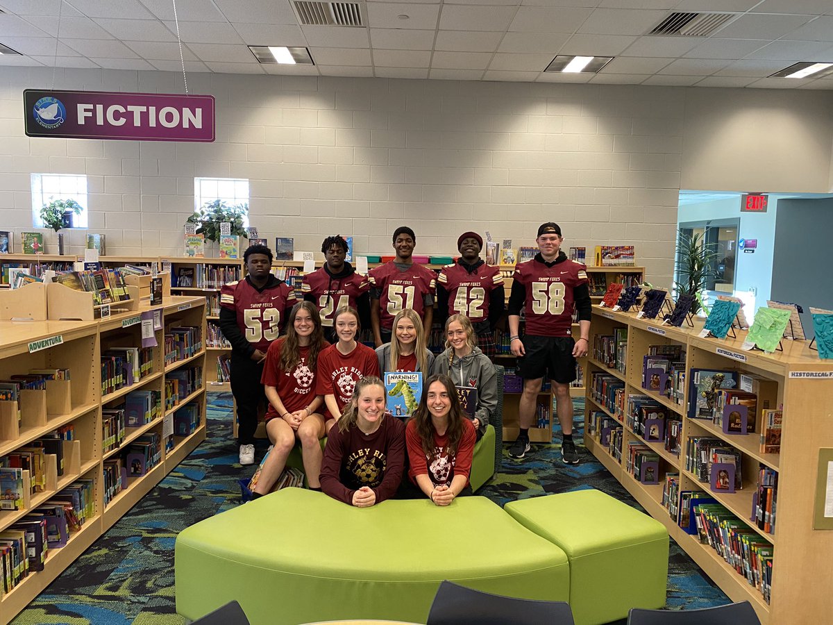 CoachFidler's tweet photo. Ashley Ridge Football student-athletes joined our Girls Soccer team today at Sires Elementary to read to their kids.  Our program loves getting out and connecting with students across @TeamDDTwo #HUNT https://t.co/HiyxJt0drg