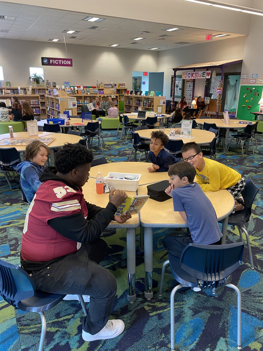 CoachFidler's tweet photo. Ashley Ridge Football student-athletes joined our Girls Soccer team today at Sires Elementary to read to their kids.  Our program loves getting out and connecting with students across @TeamDDTwo #HUNT https://t.co/HiyxJt0drg
