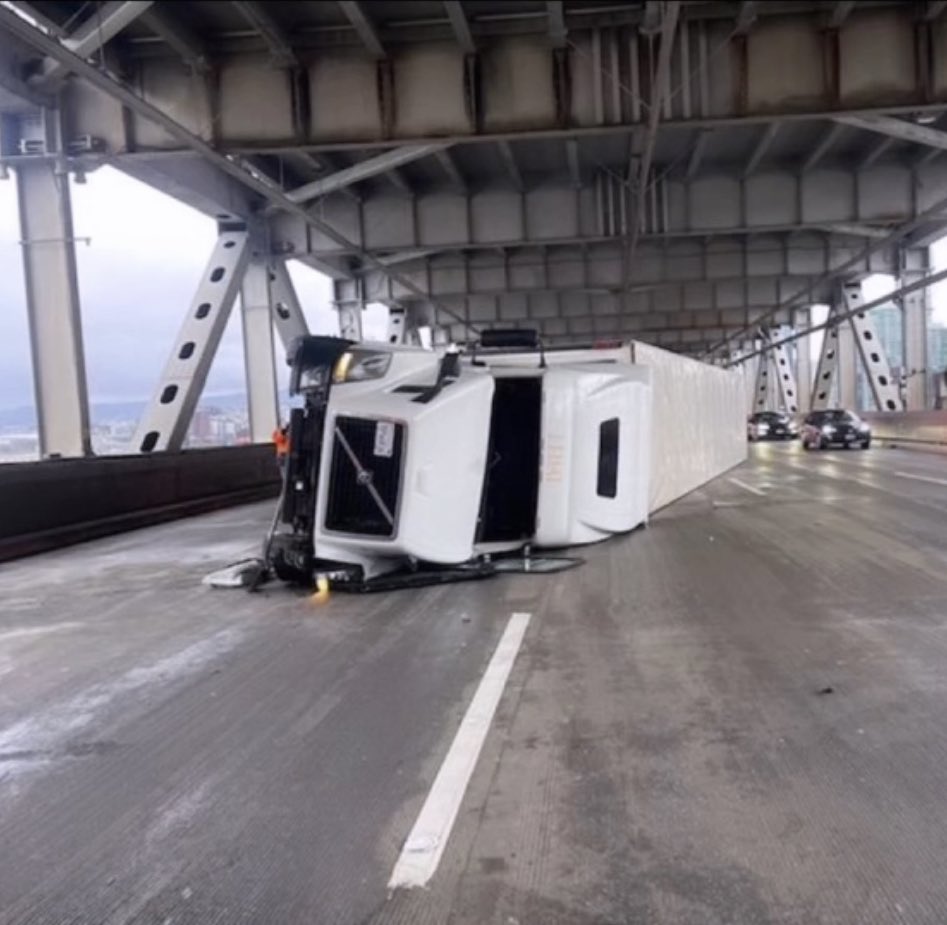 NorCal_Skywarn's tweet photo. Trucks and High Winds don’t go together. Yesterday during the High Winds a truck rolled over on the #BayBridge EastBound I-80 before Treasure Island. It happened back in December but on the Richmond Bridge (I-580) #CAWx #TravelWx #BayAreaWx #MarchWx #AlertSF https://t.co/1kgtXHJOm0