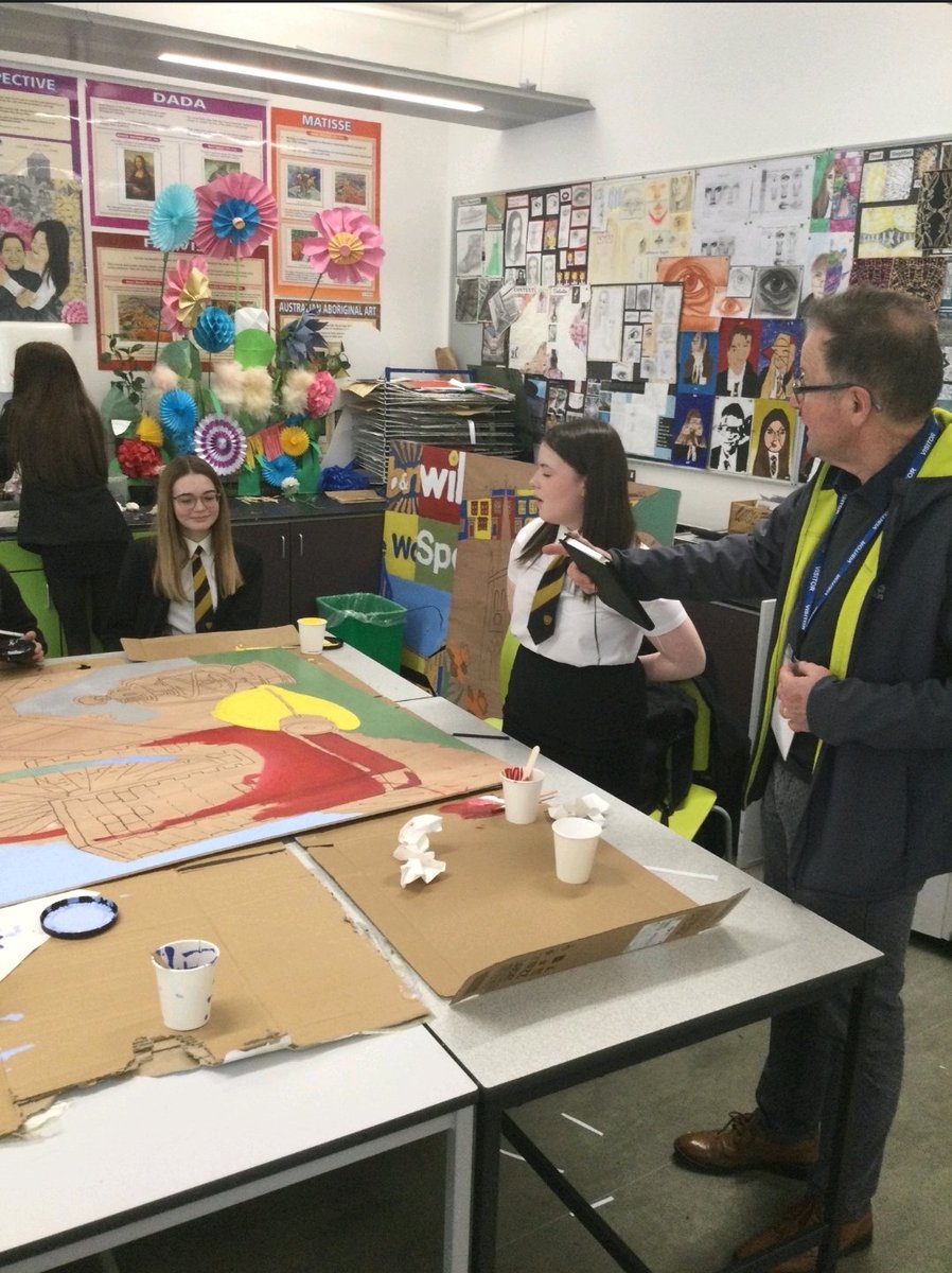 acs_art's tweet photo. Today 8G1 had the pleasure of inviting Terry Davies from @AlunGriffiths_  Griffiths construction into their lesson. Here they can be seen working together on their designs for the hoardings for the rail works taking place at Aberdare train station. https://t.co/PF4B7uWiSD
