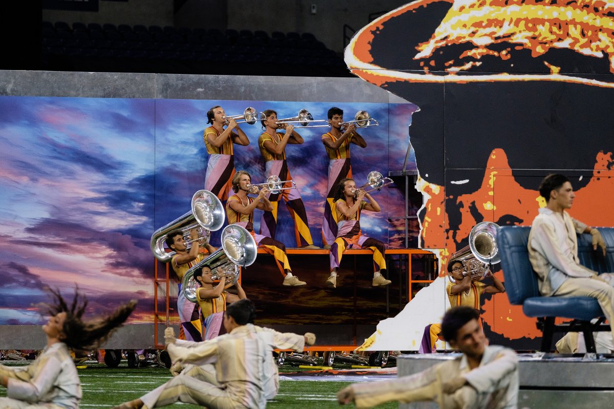 Bluecoats's tweet photo. We're selling pieces of our #Bloo22 set!

- (1) Main Stage: Billboard and Large Main Character Silhouette
- (7) “Cadillac” Rolling Backdrops with Guard Storage
- (1) 8’ x 12’ Giant Rolling Wheels &amp; Axles

Visit https://t.co/DB22iLjtdz for more details! https://t.co/fvYUUrt7el