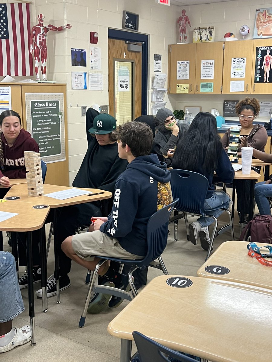 AshleySimp1023's tweet photo. Concussion Jenga Review today in Athletic Injuries class! Each Jenga block has a number on it that corresponds with a question on the review sheet, as students pull blocks they answer the questions and the team with the least falls wins 😊 @HilarieBlum @mmfraine @Mainlandhigh https://t.co/Wqwqkp1Qh4