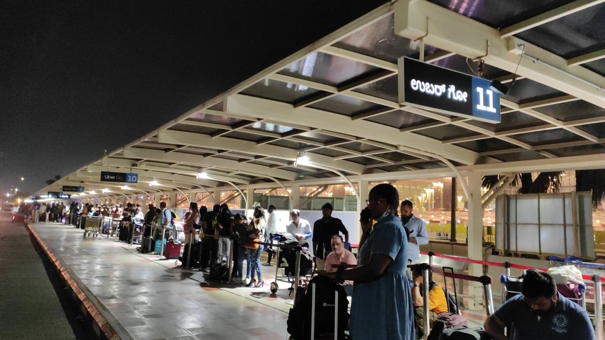 atishpodder's tweet photo. @Uber_India @Uber_Support people are waiting at bangalore airport waiting for uber for MORE THAN 2 HOURS. yet no cars... What's happening!! Long queue is waiting... https://t.co/VyRNFYTM9q