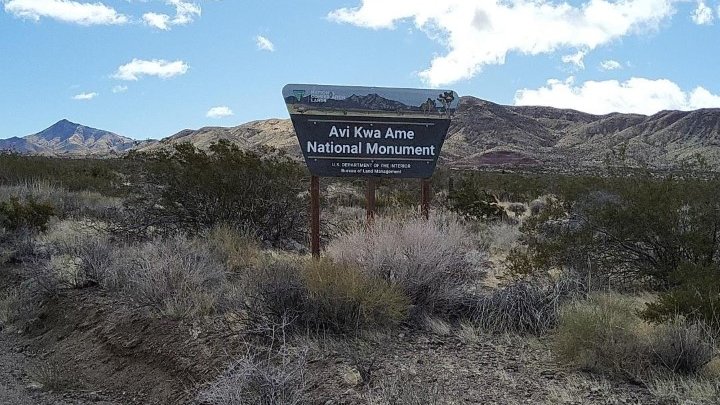 SecDebHaaland's tweet image. .@POTUS made the Avi Kwa Ame National Monument designation official yesterday. Then, our @BLMNational and @blmnv teams faced the rain, sleet and cold winds to get the signs up quickly. 

Now, it's "official, official"!