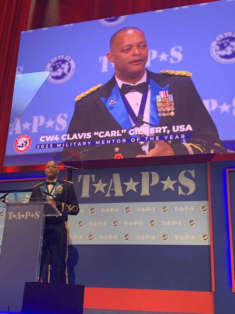 TAPSorg's tweet photo. Tonight, TAPS presented CW4 Carl Gilbert, @USArmy, with its Military Mentor of the Year Award, for his support of military surviving children. Carl has been a mentor to the surviving sons of SGT Jason Sylvester, #usarmy, &amp; they were onstage to present Carl with the award. https://t.co/6K9nz9DR9f