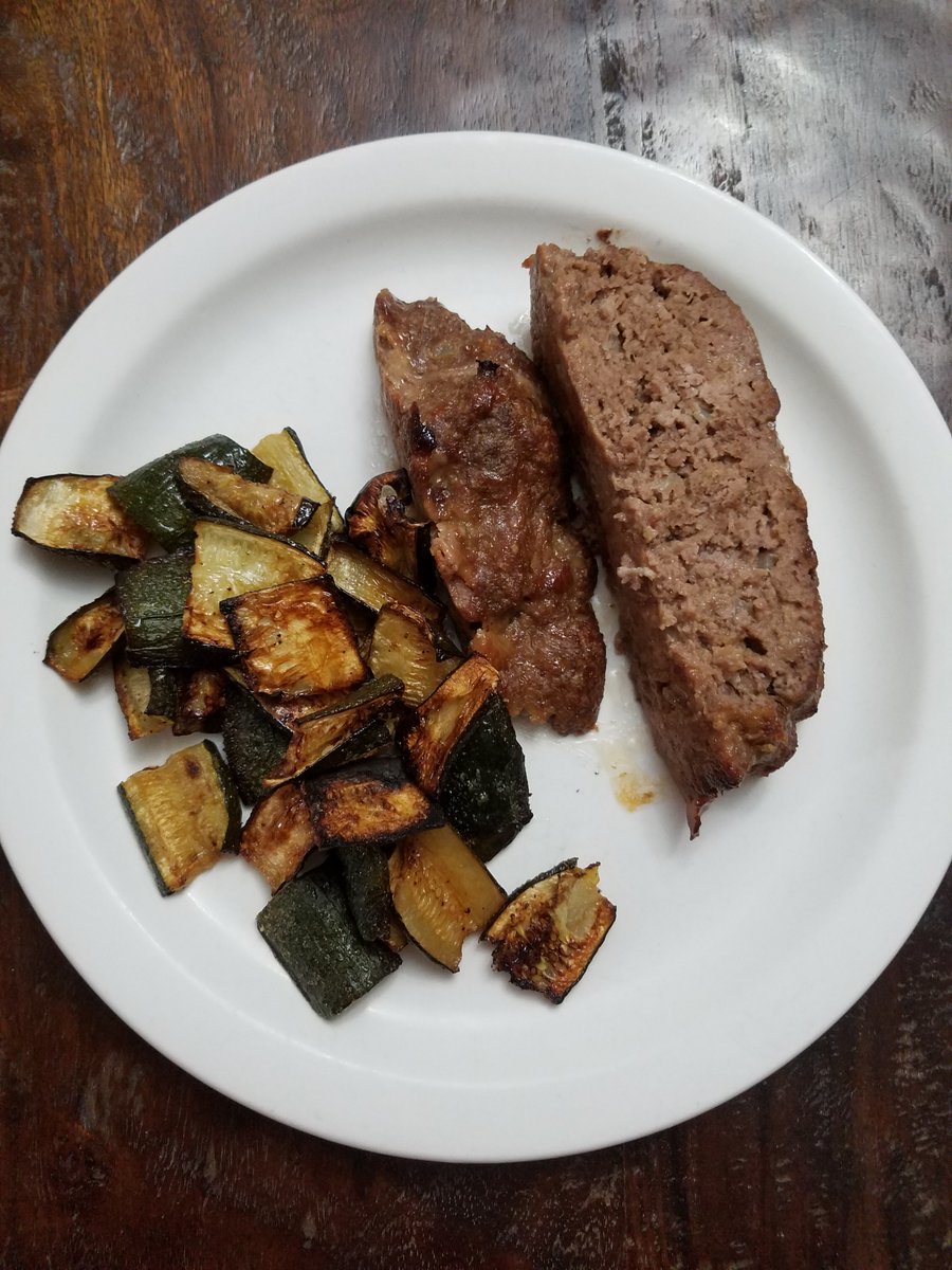 FossilMan's tweet photo. Cheryl's out of town for a week, helping her sister and run an EAL (equine assisted learning) certification academy. Fortunately, #Gregcancook. My famous Korean meatloaf with roasted zucchini. https://t.co/uPvNdcRJxZ