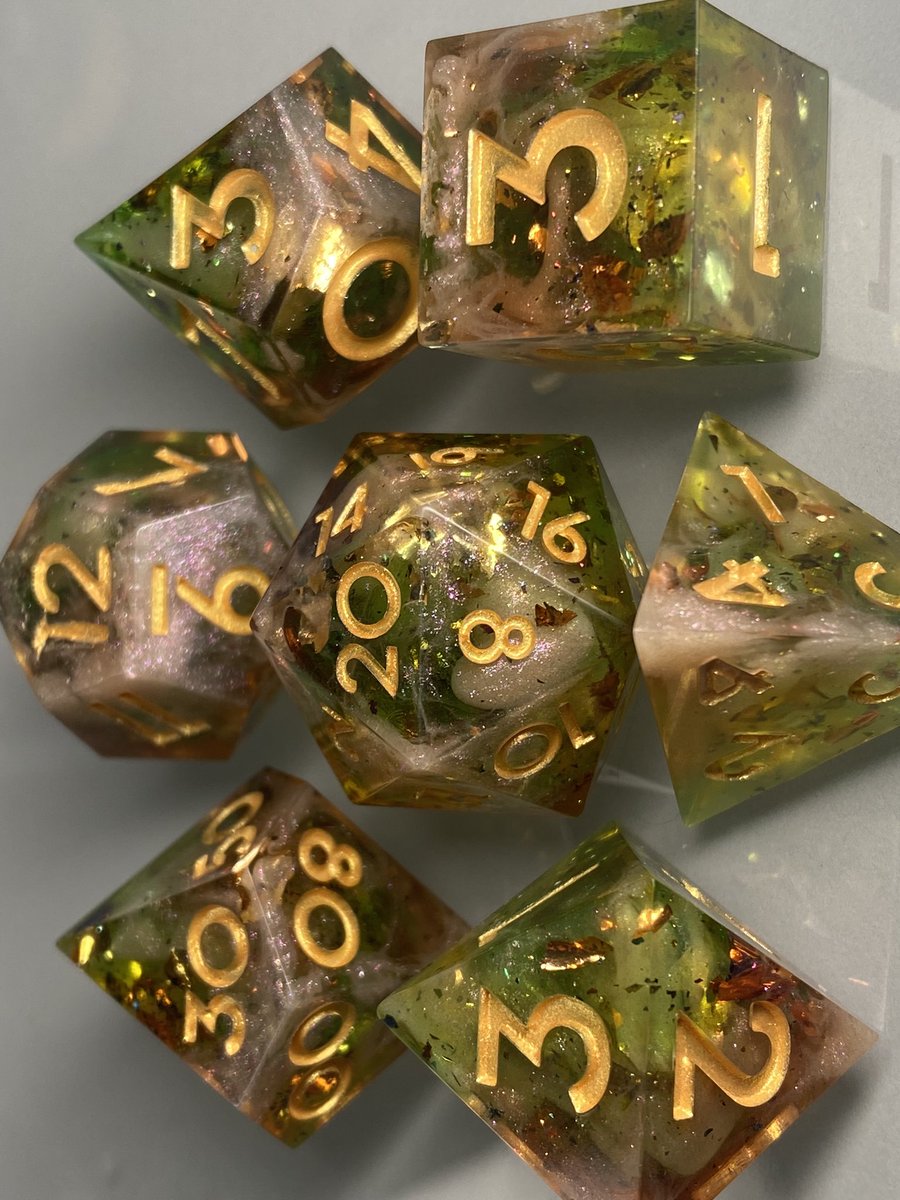 CarleySteichen's tweet image. ✨✨New Dice for Sale✨✨

New sharp edge resin dice for sale in my Etsy shop. I am calling them Forest of Light. 

You can check them out here: etsy.com/listing/143090…

#handmadedice #sharpedgedice #ttrpg #ttrpgfamily #ttrpgcommunity #dice